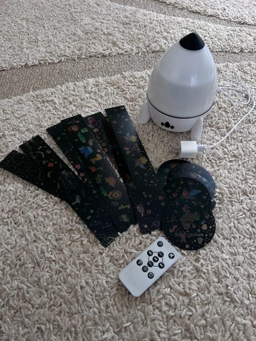 Projector Rocket shaped white and Black with Remote. Kids room